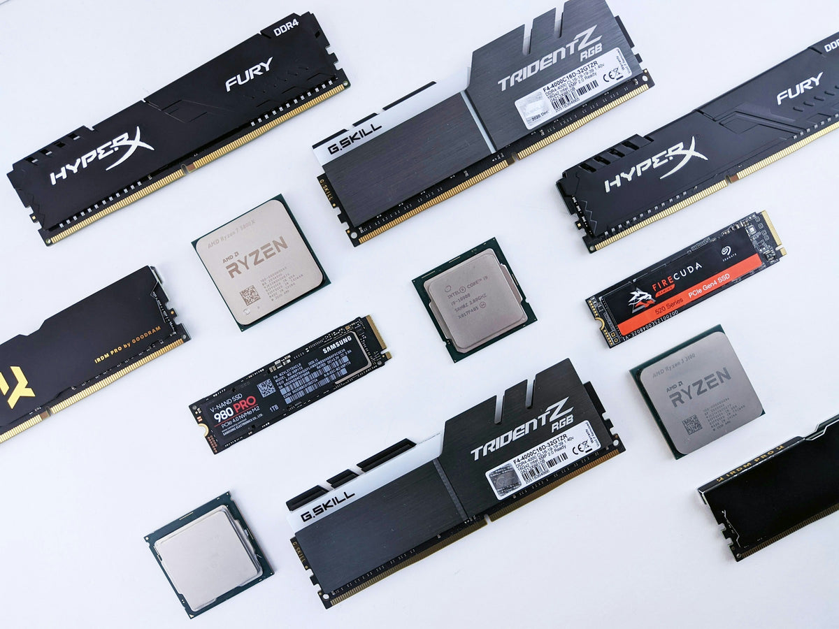 PC components — RAM, CPUs, and SSDs arranged diagonally